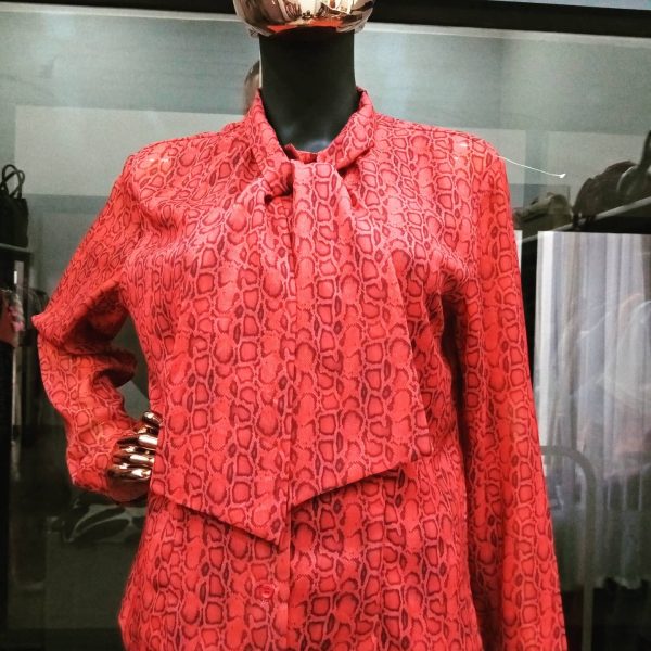 RED BLOUSE WITH SNAKE PRINT